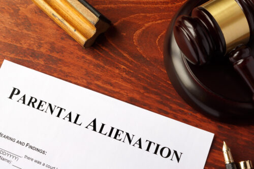 Parental alienation form and gavel on a table.